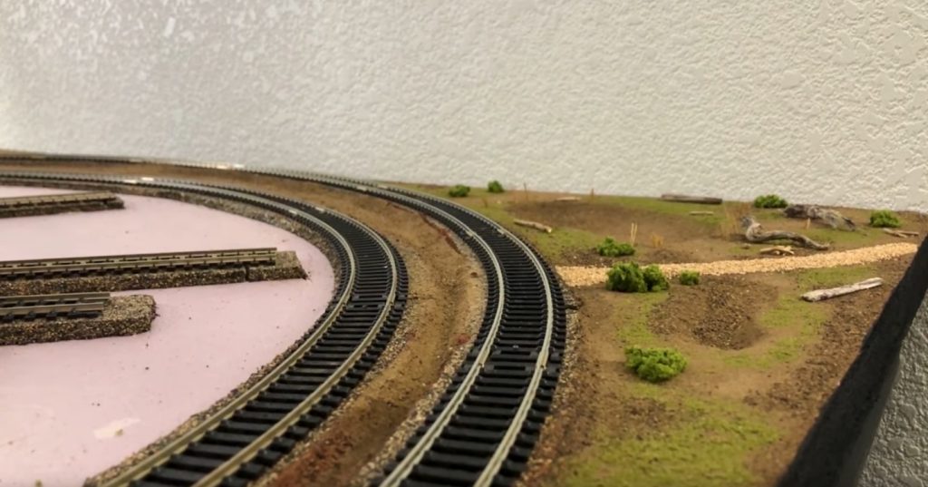 Schaffen Sie eine Landschaft für Ihre Eisenbahn